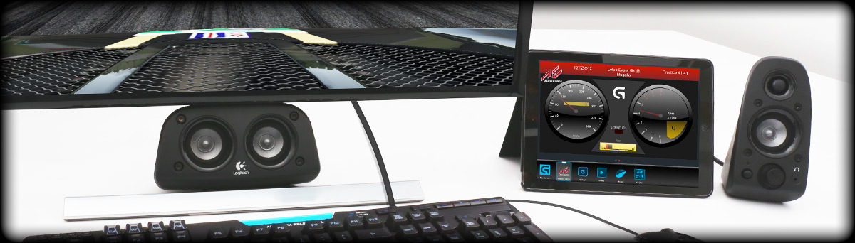 Logitech's Z906 speakers, G mouse, G910 keyboard, external monitor and tablet displaying ARX control status